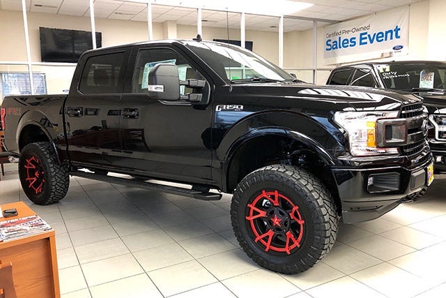 Black F-150 with Jimmie Allen Red Rims at All American Ford of Paramus in Paramus NJ